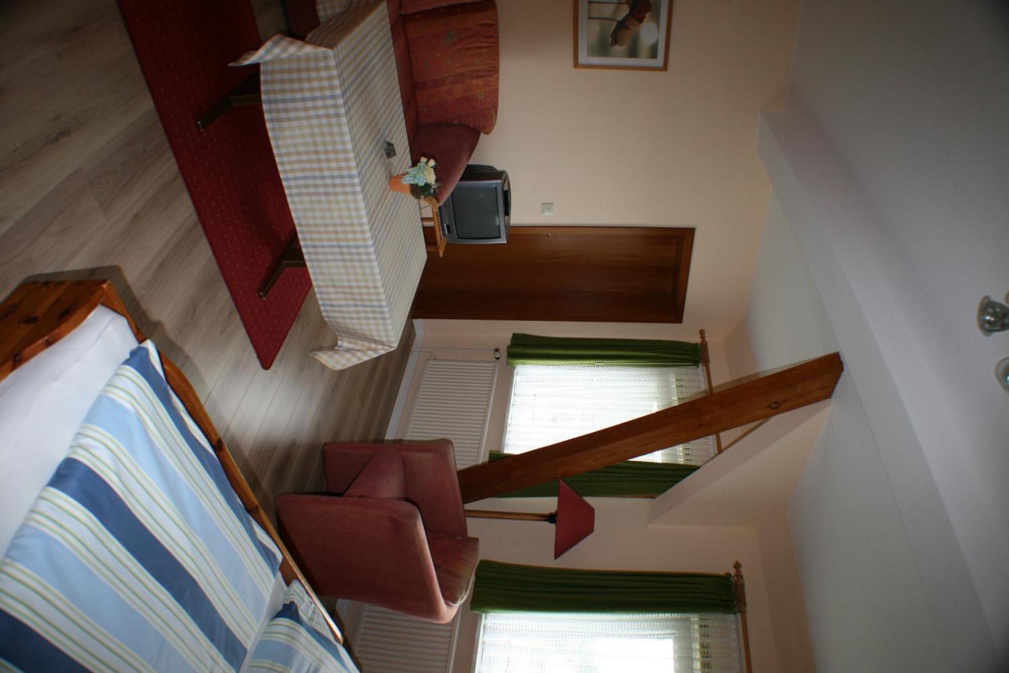 Hotel Garni Zur Post Utersum Værelse billede